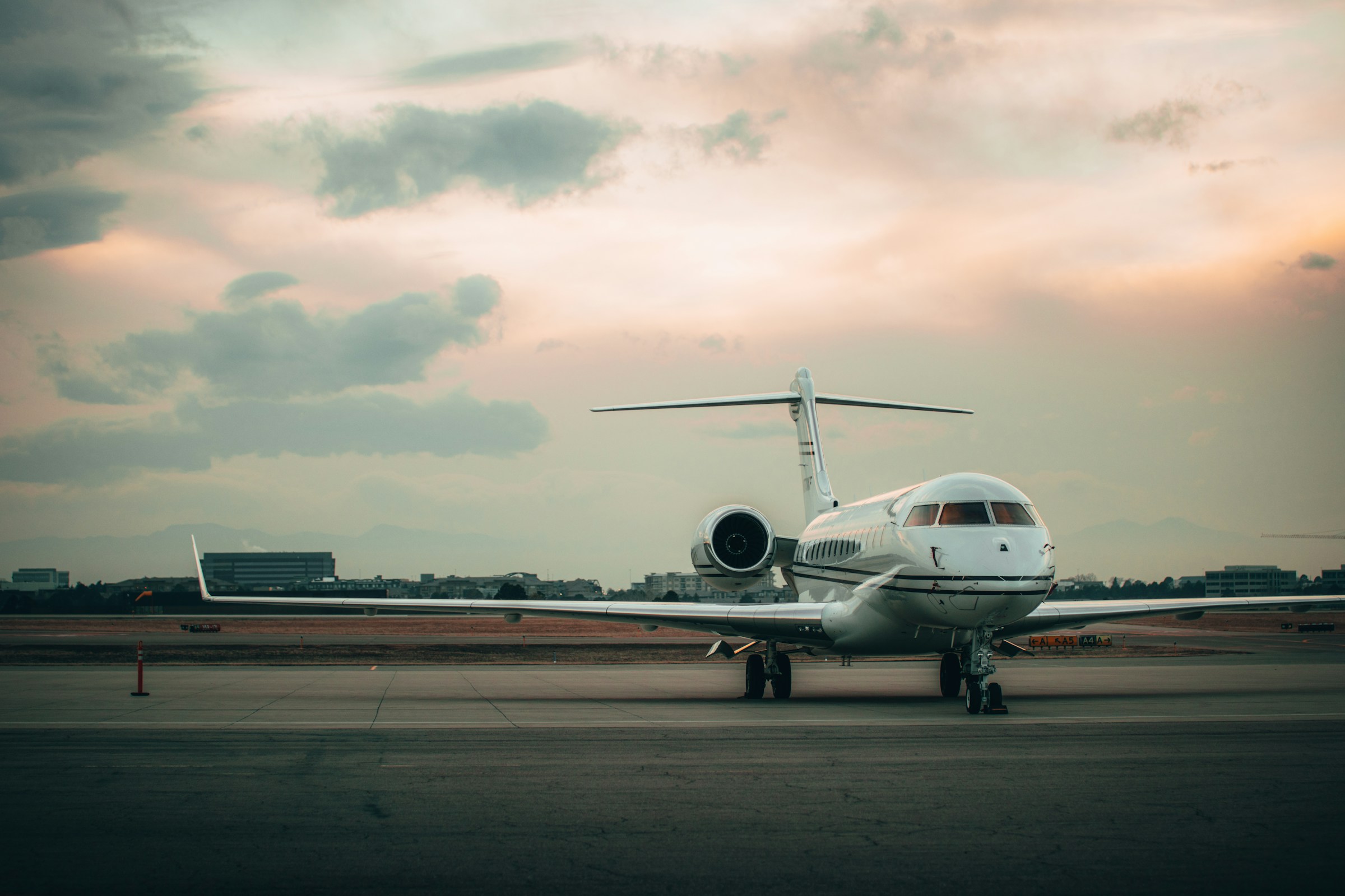 Business jet on the apron at dusk